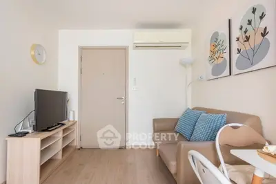 Cozy living room with modern decor and air conditioning