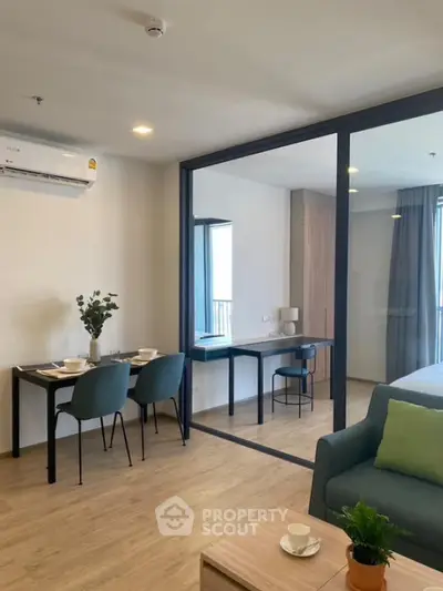 Modern studio apartment with open layout and stylish furnishings