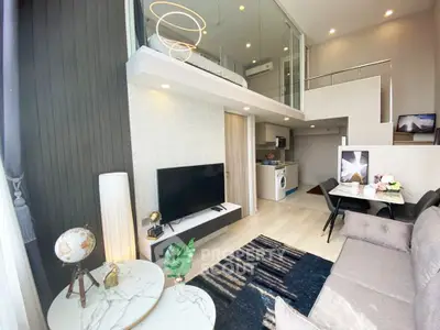 Modern loft apartment with stylish living room and mezzanine bedroom