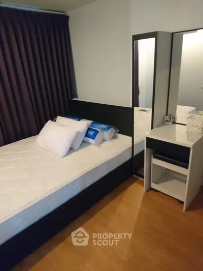Cozy bedroom with modern furniture and large mirror