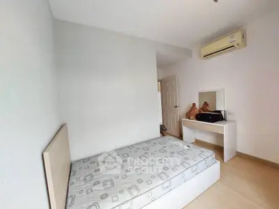 Cozy minimalist bedroom with air conditioning and modern decor
