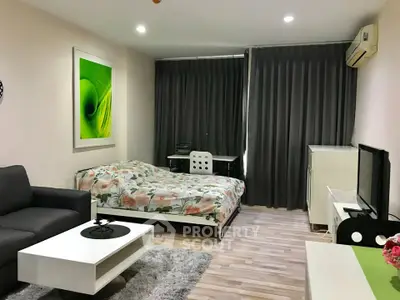 Modern studio apartment with stylish decor and cozy living area