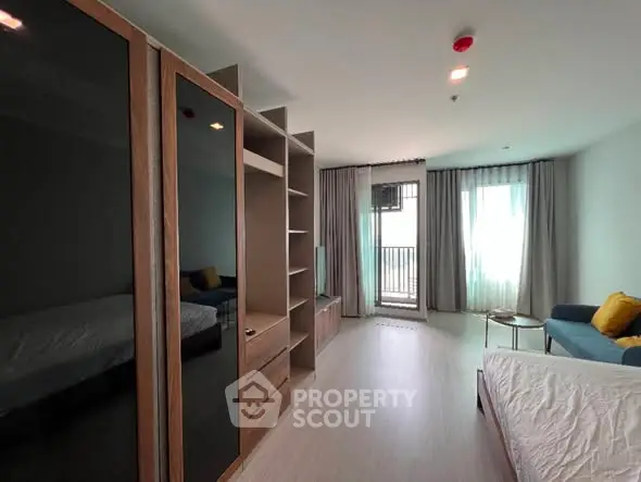 Modern studio apartment with stylish furniture and natural light