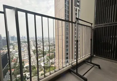 High-rise balcony with stunning cityscape view, perfect for urban living enthusiasts.
