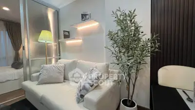 Modern living room with cozy sofa and stylish decor