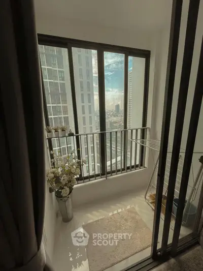 Charming balcony with city view, perfect for relaxation and enjoying the skyline.