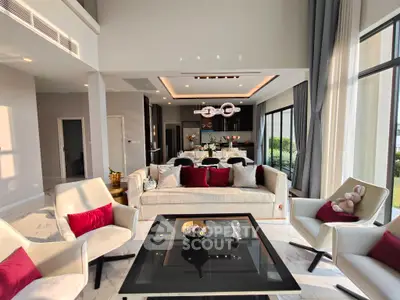 Luxurious modern living room with elegant decor and open kitchen layout