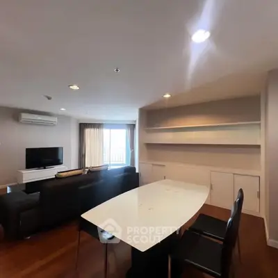 Spacious modern living room with sleek furniture and natural light