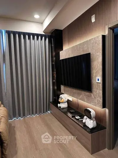 Modern living room with sleek TV setup and stylish decor