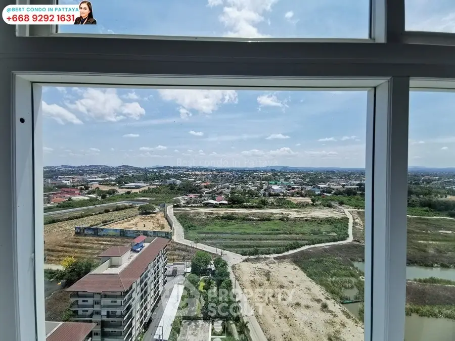 Stunning panoramic view from high-rise condo in Pattaya with expansive windows and scenic landscape.