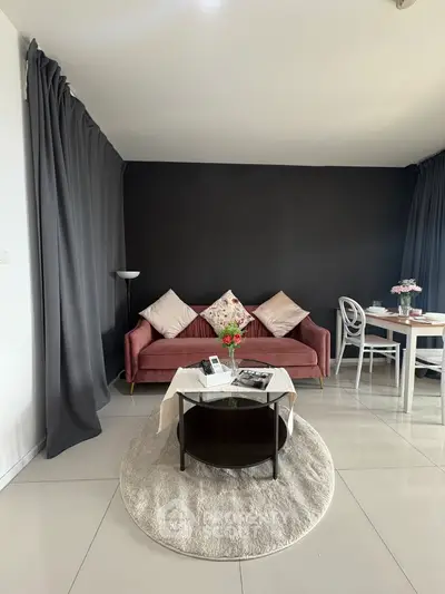 Modern living room with stylish decor and cozy seating area, perfect for relaxation and entertaining.