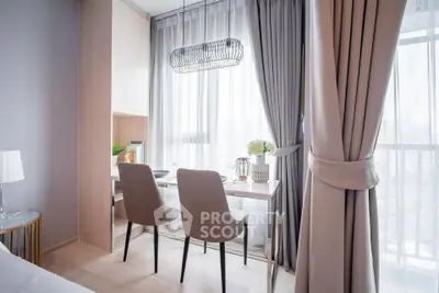 Modern study area with elegant chairs and natural light in a stylish apartment.