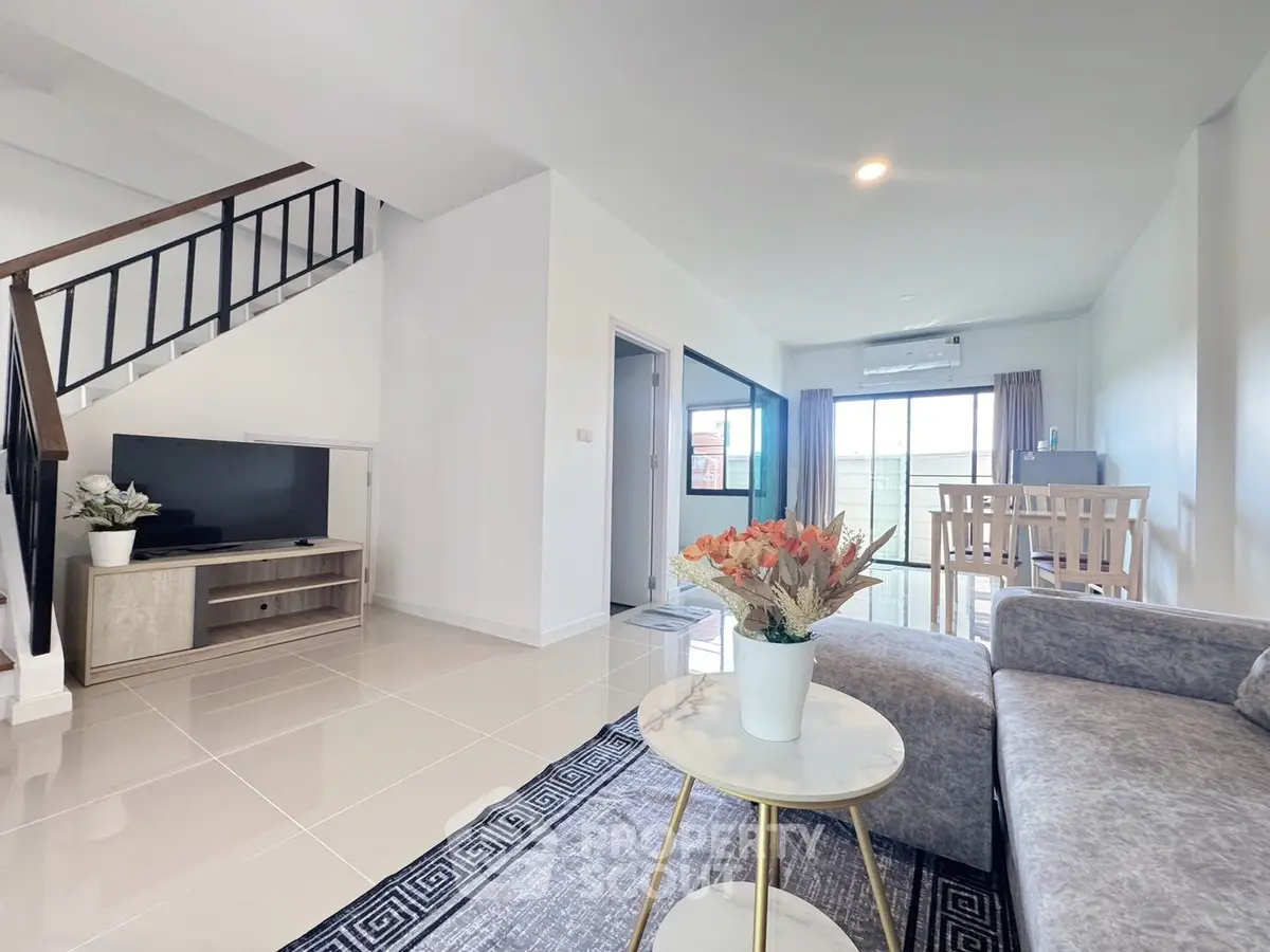 Modern living room with sleek design and natural light