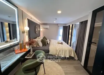 Luxurious modern bedroom with elegant decor and ample natural light