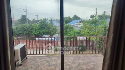 Spacious balcony with scenic view of suburban neighborhood