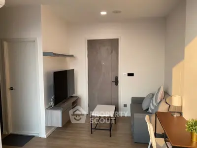 Cozy modern living room with TV and stylish furniture