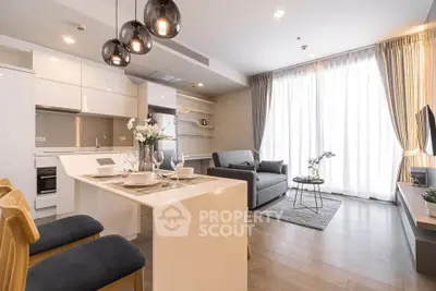 Modern open-plan living room with stylish kitchen and elegant decor