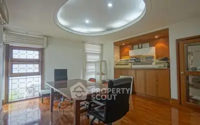 Elegant study room with polished wooden floors and modern furniture