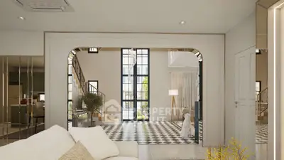 Luxurious open-plan living area with high ceilings and elegant decor