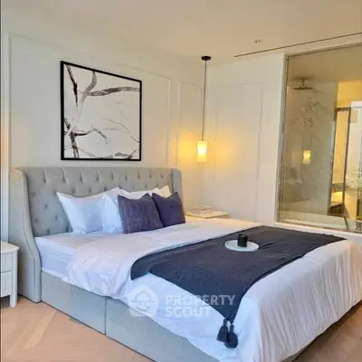 Luxurious bedroom with elegant decor and modern lighting
