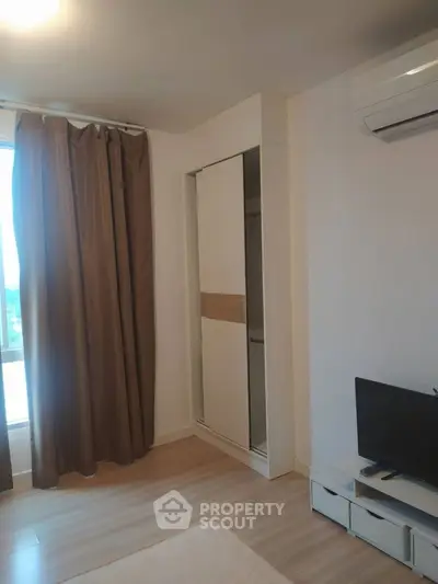 Modern living room with sleek design and cozy ambiance