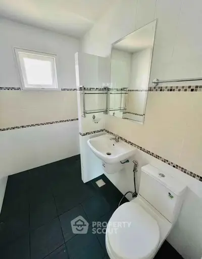 Modern bathroom with sleek fixtures and natural light