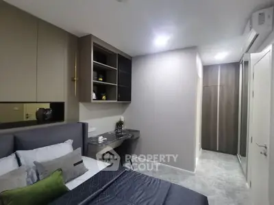 Modern bedroom with sleek design and built-in storage solutions