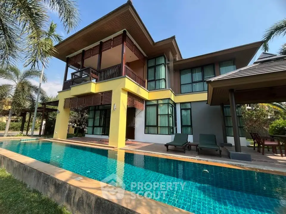 Luxurious tropical villa with private pool and lush garden, perfect for serene living.