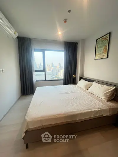 Modern bedroom with city view and stylish decor