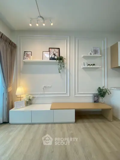 Modern living room with stylish decor and wooden flooring