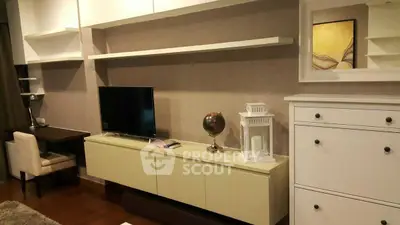 Modern living room with sleek TV unit and stylish decor