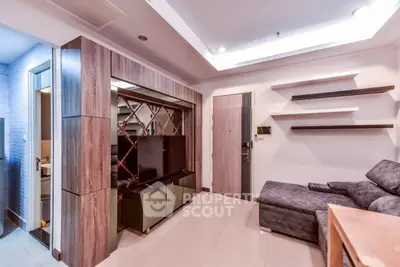 Modern living room with sleek design and cozy furniture in a stylish apartment.