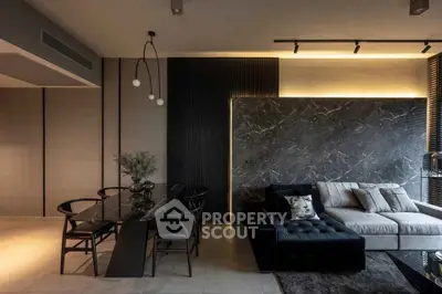 Luxurious modern living room with elegant black marble wall and stylish furniture