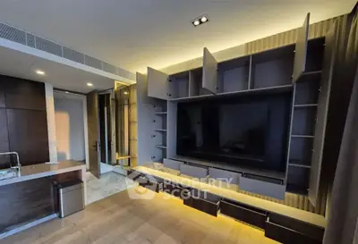 Modern living room with built-in entertainment center and open shelving