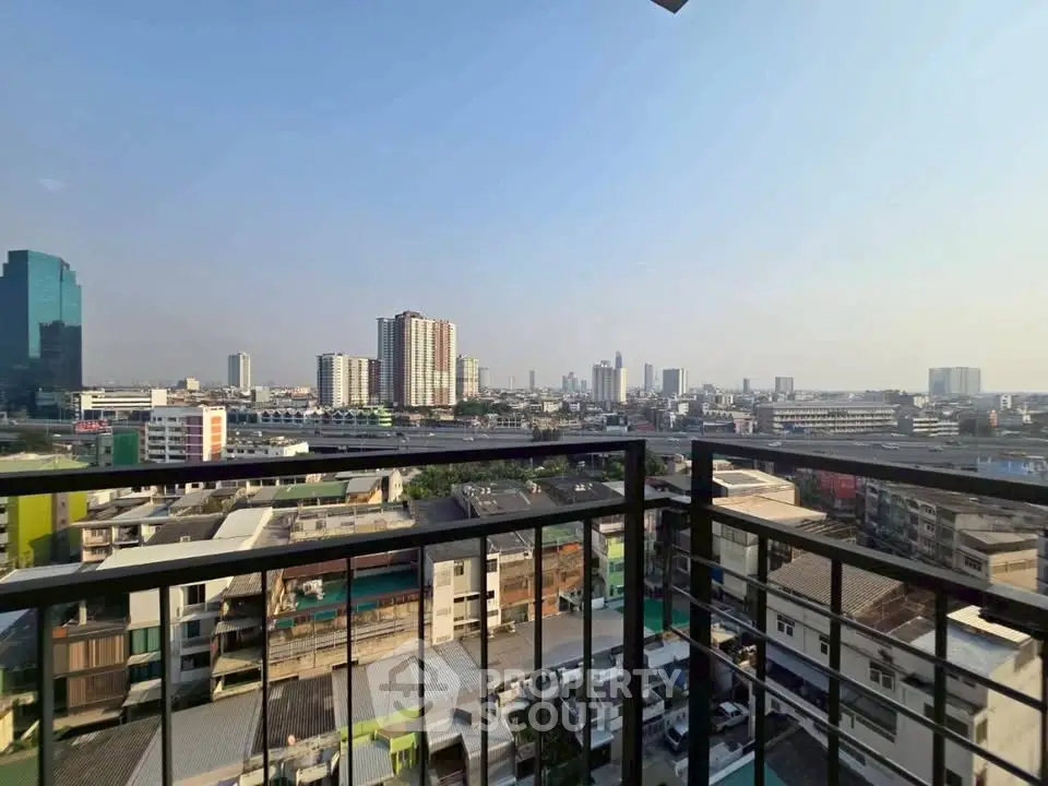 Stunning cityscape view from a high-rise balcony, perfect for urban living enthusiasts.