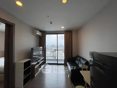 Modern living room with balcony view in a stylish apartment