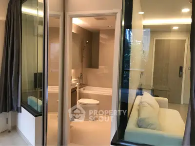 Modern apartment interior with bathroom and cozy living area