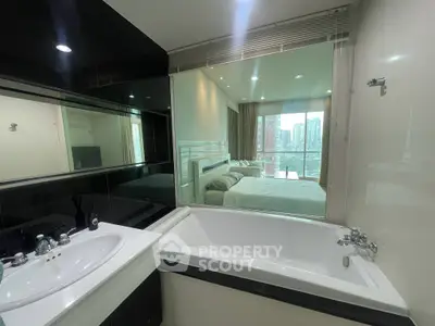Luxurious bathroom with bathtub and city view in modern apartment