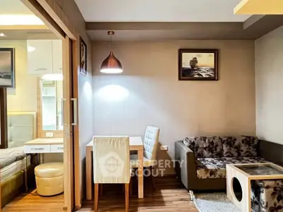 Cozy living room with modern decor and dining area in stylish apartment