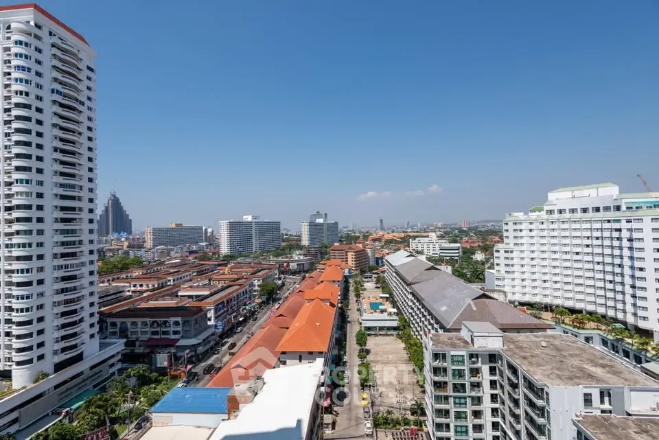 Stunning cityscape view from a high-rise building showcasing urban architecture and vibrant skyline.