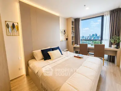 Luxurious bedroom with stunning city view and elegant decor