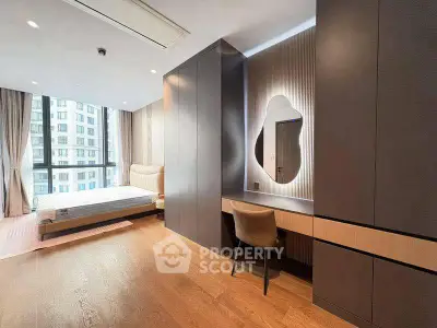 Luxurious modern bedroom with floor-to-ceiling windows and elegant furnishings in a high-rise apartment.