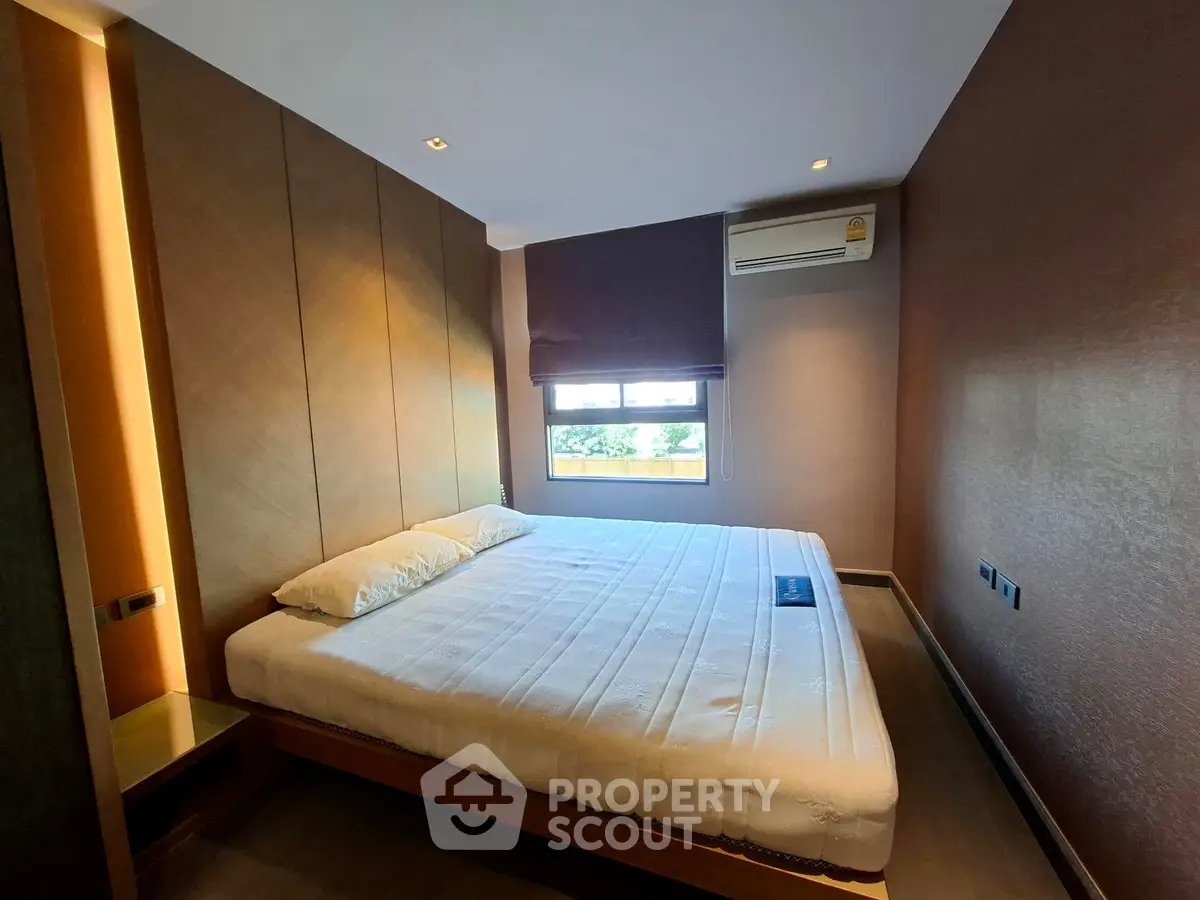 Modern bedroom with sleek design and natural light