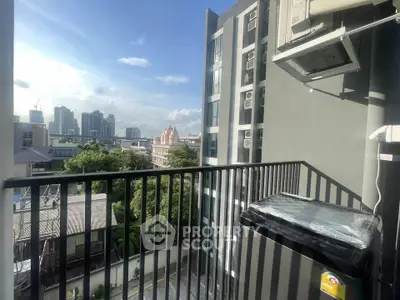 Modern apartment balcony with city view and air conditioning unit