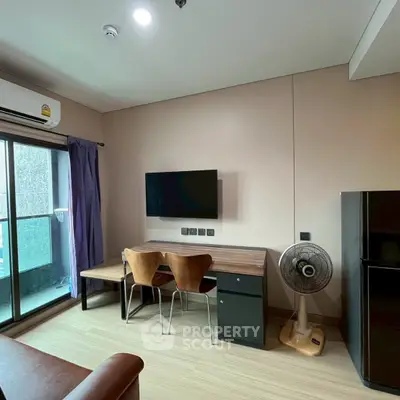 Modern living room with balcony access and sleek furniture