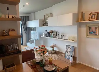 Stylish living room with modern decor and open shelving, perfect for contemporary living.