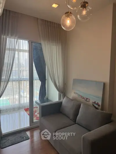 Cozy living room with modern sofa and balcony view