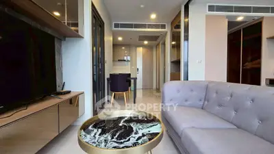 Modern living room with stylish furniture and open layout in a contemporary apartment.