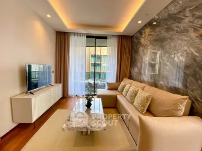 Luxurious living room with elegant marble wall and modern furniture
