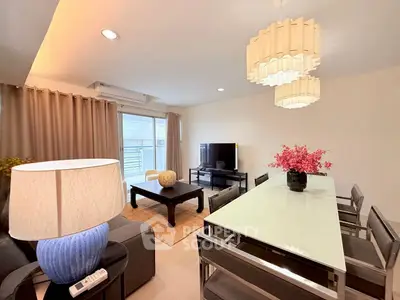 Modern living room with elegant decor and spacious dining area